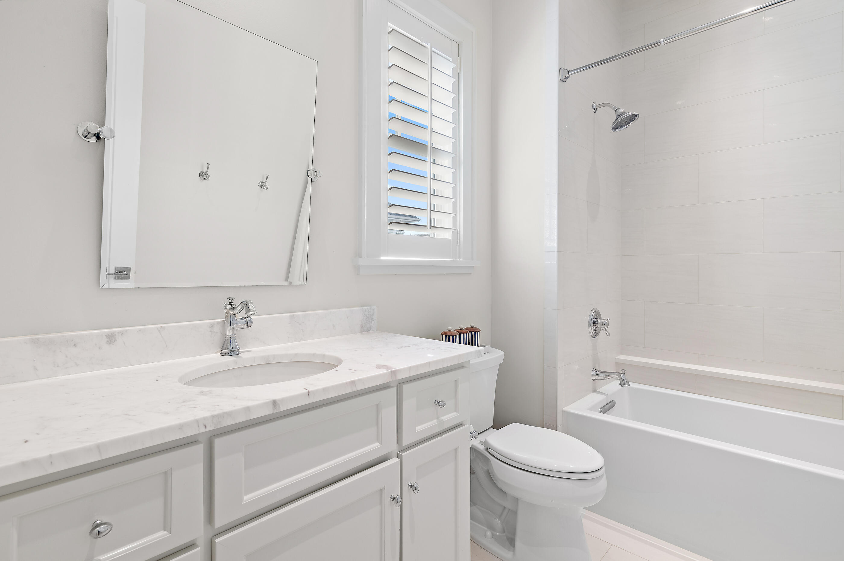 259 Moonlit Way Destin, FL 32541 - Photo 45 of 51 a bathroom with a sink toilet vanity and bathtub