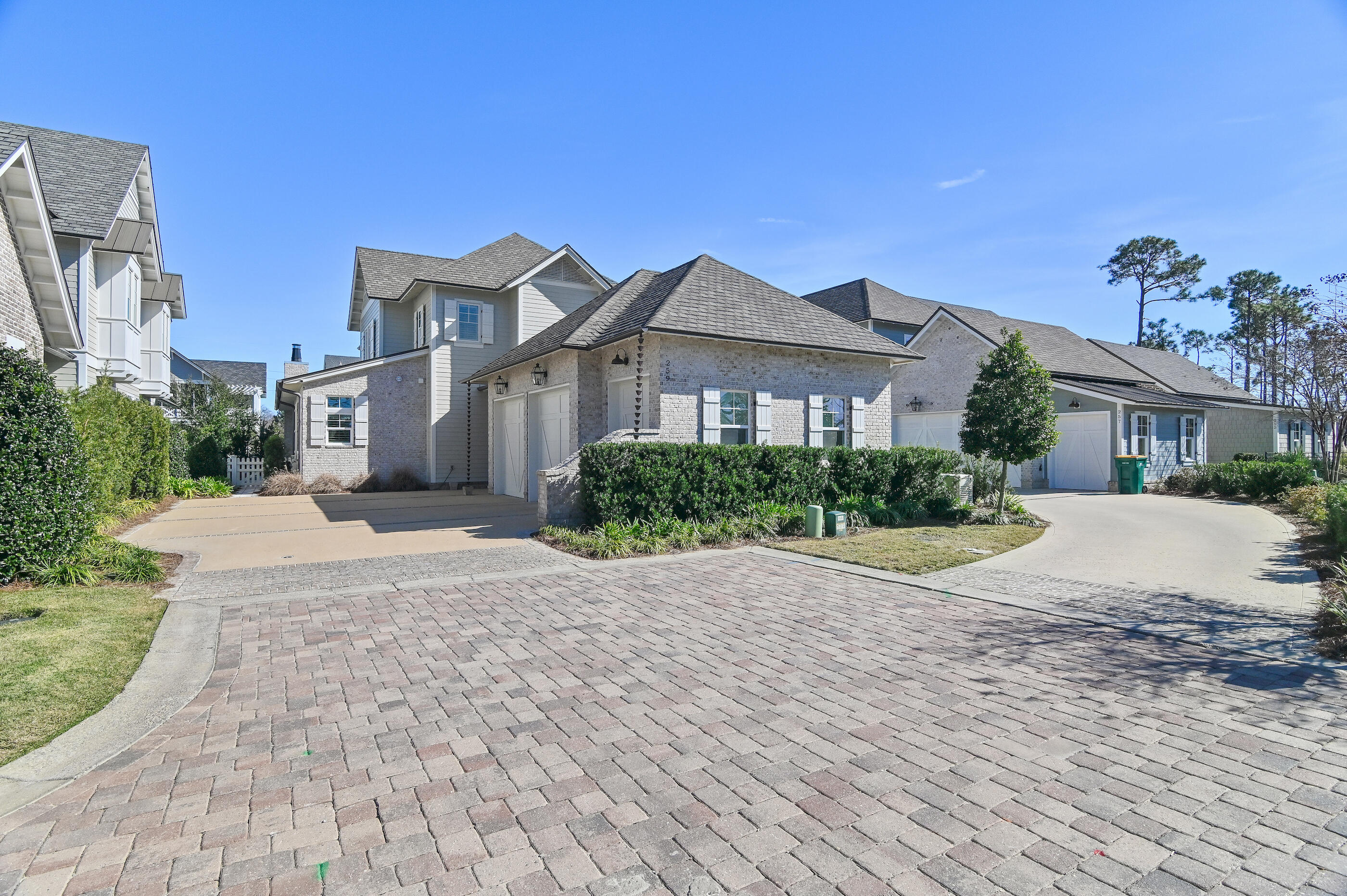 259 Moonlit Way Destin, FL 32541 - Photo 5 of 51 a front view of a house with a yard and potted plants