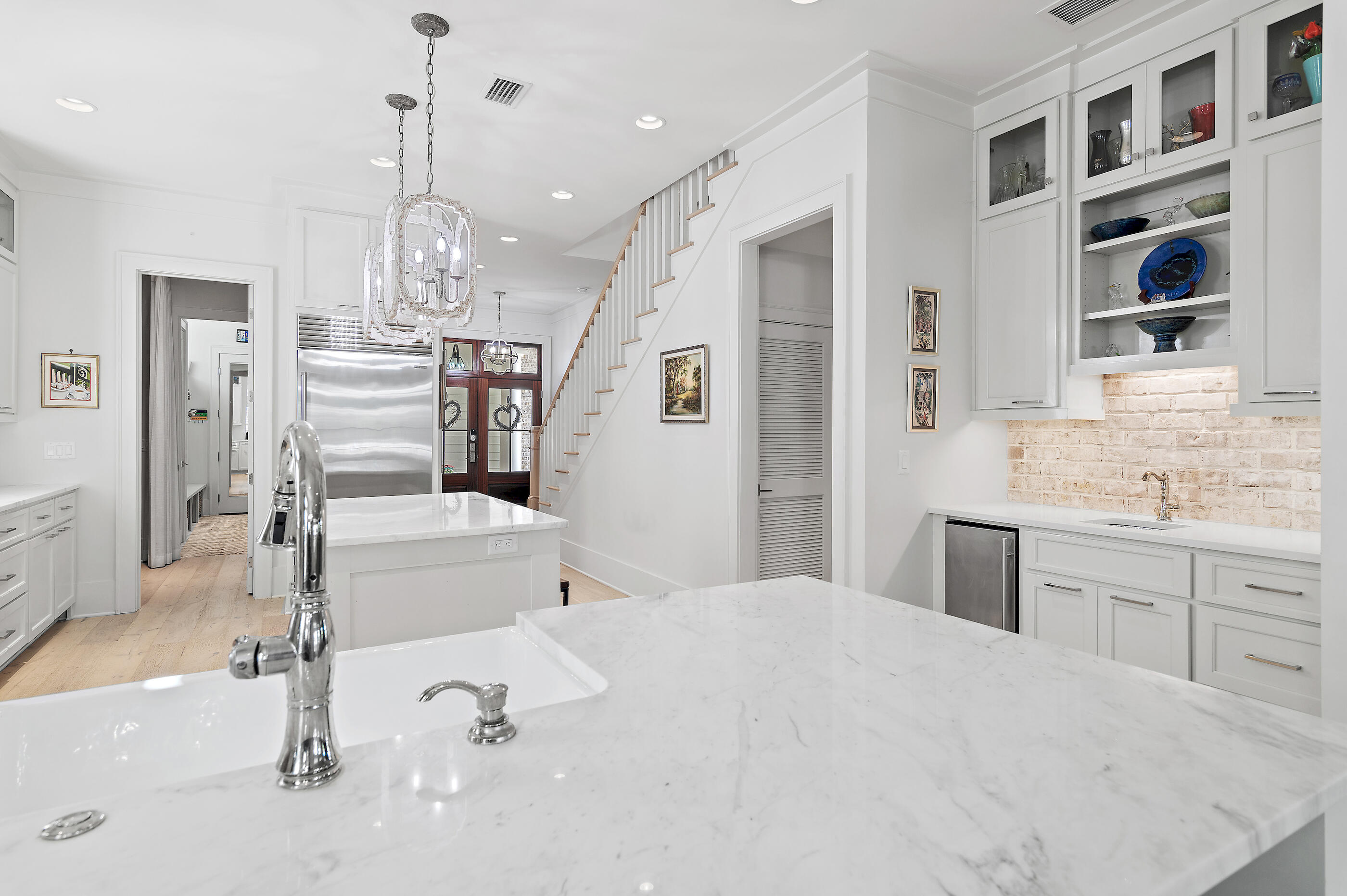 259 Moonlit Way Destin, FL 32541 - Photo 10 of 51 a large white bathroom with a granite countertop sink mirror and shower