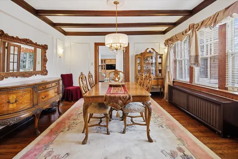 a living room with furniture fireplace and flat screen tv