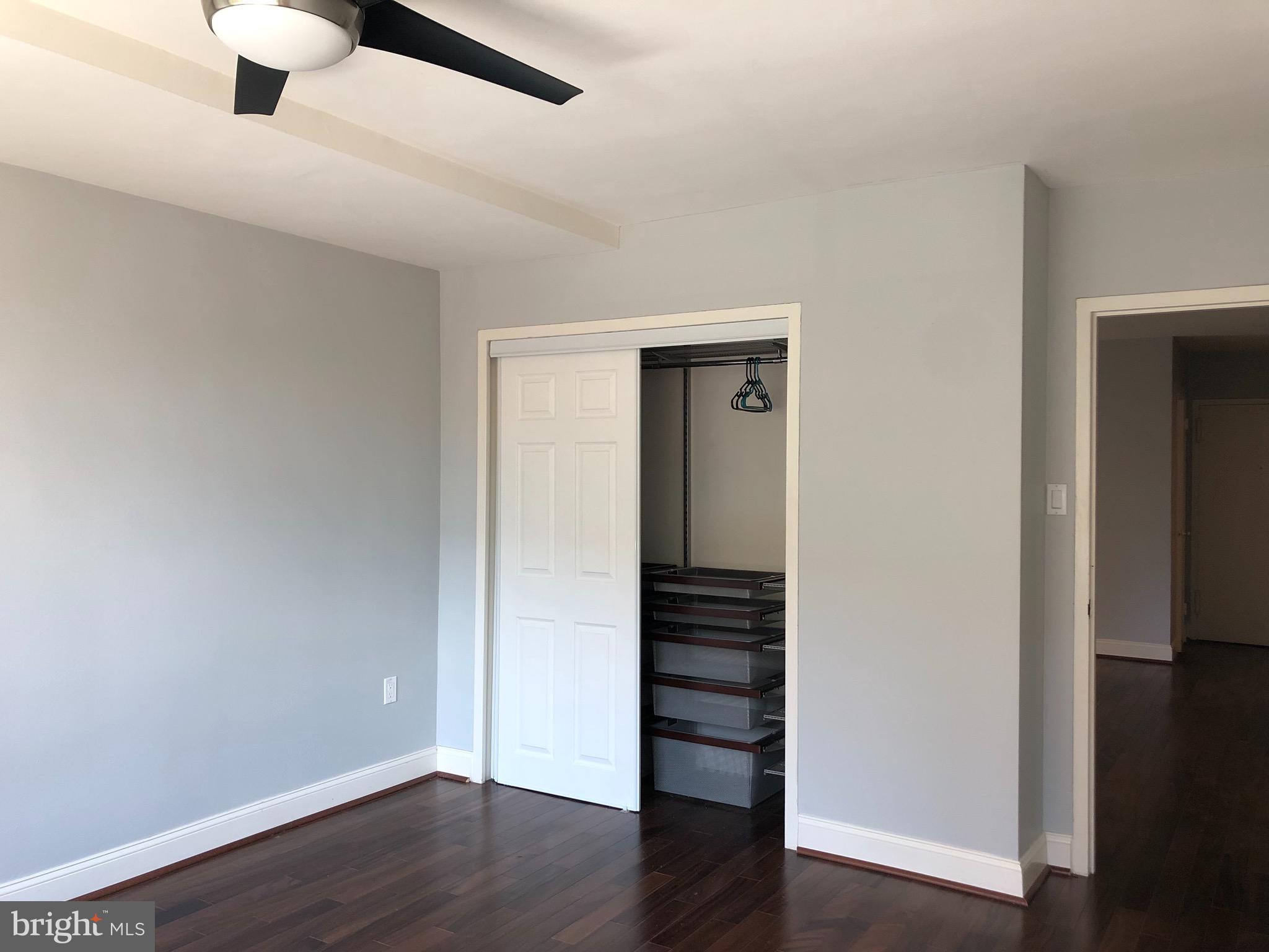 1021 Arlington Boulevard, Unit 706 Arlington, VA 22209 - Photo 9 of 24 wooden floor in an empty room