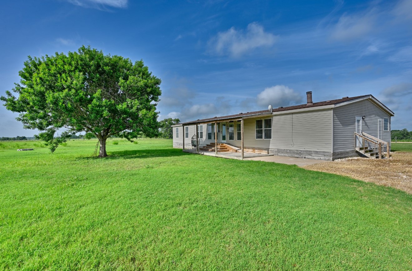 10901 Harmon School Road Burton, TX 77835 - Photo 18 of 23 a view of an house with backyard space and garden
