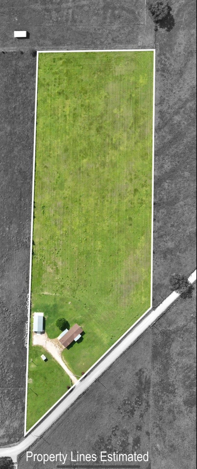 10901 Harmon School Road Burton, TX 77835 - Photo 21 of 23 a view of a back yard