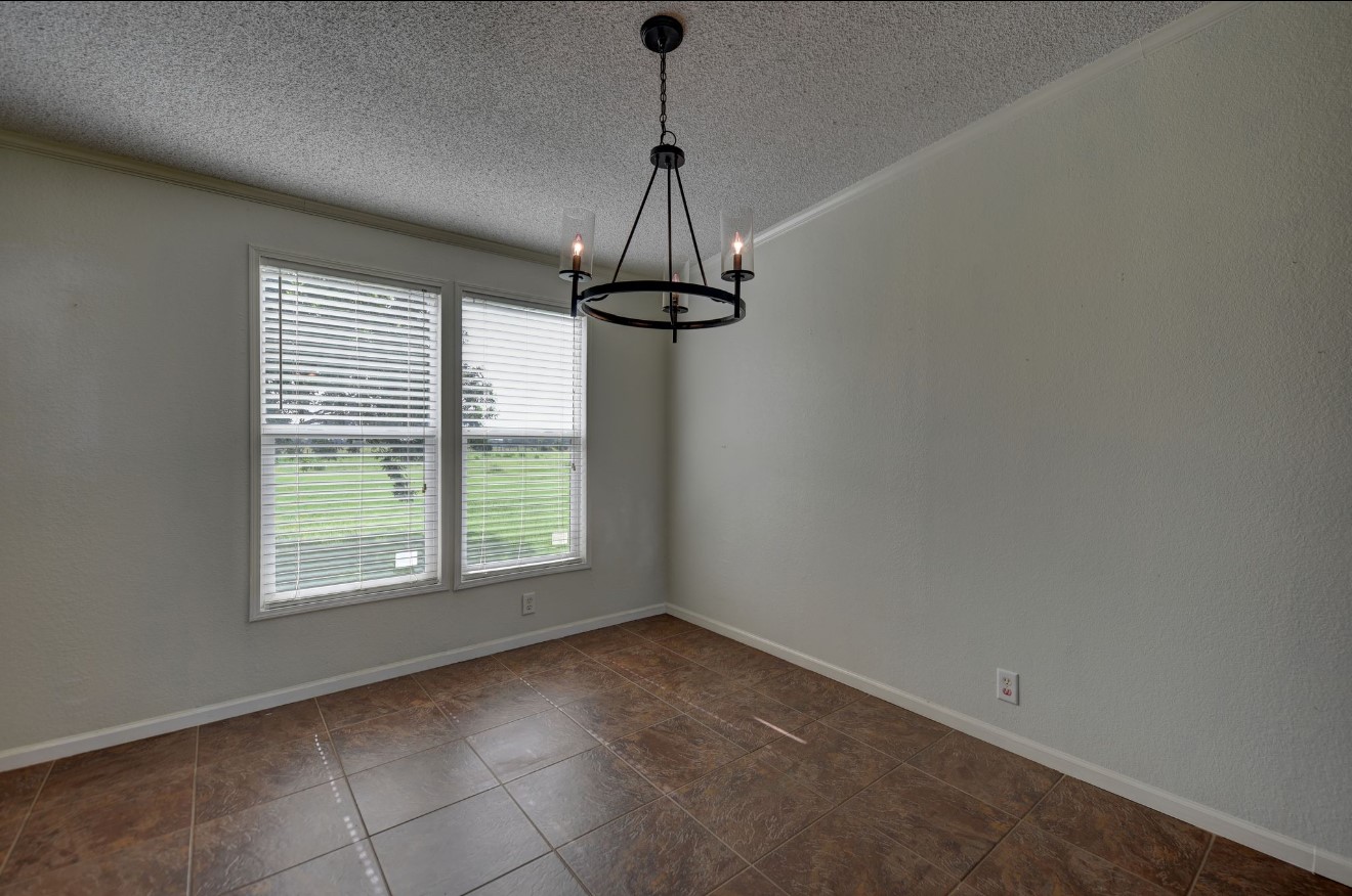 10901 Harmon School Road Burton, TX 77835 - Photo 8 of 23 a view of an empty room with a window