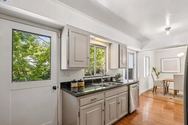 a kitchen with a sink and a window