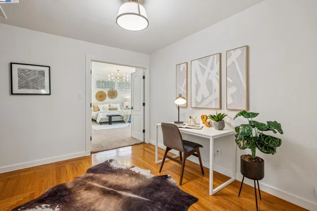 a workspace with furniture and window