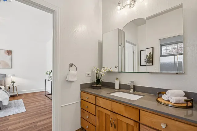 a bathroom with a sink and a mirror