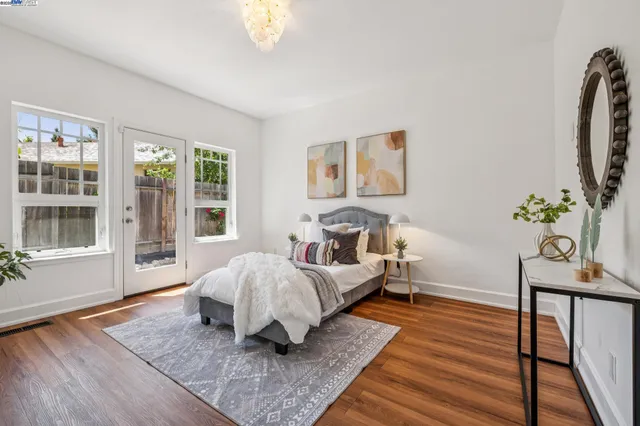 a bed room with a bed and a window