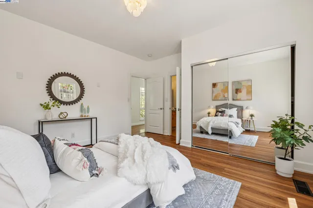 a bedroom with furniture and a bed