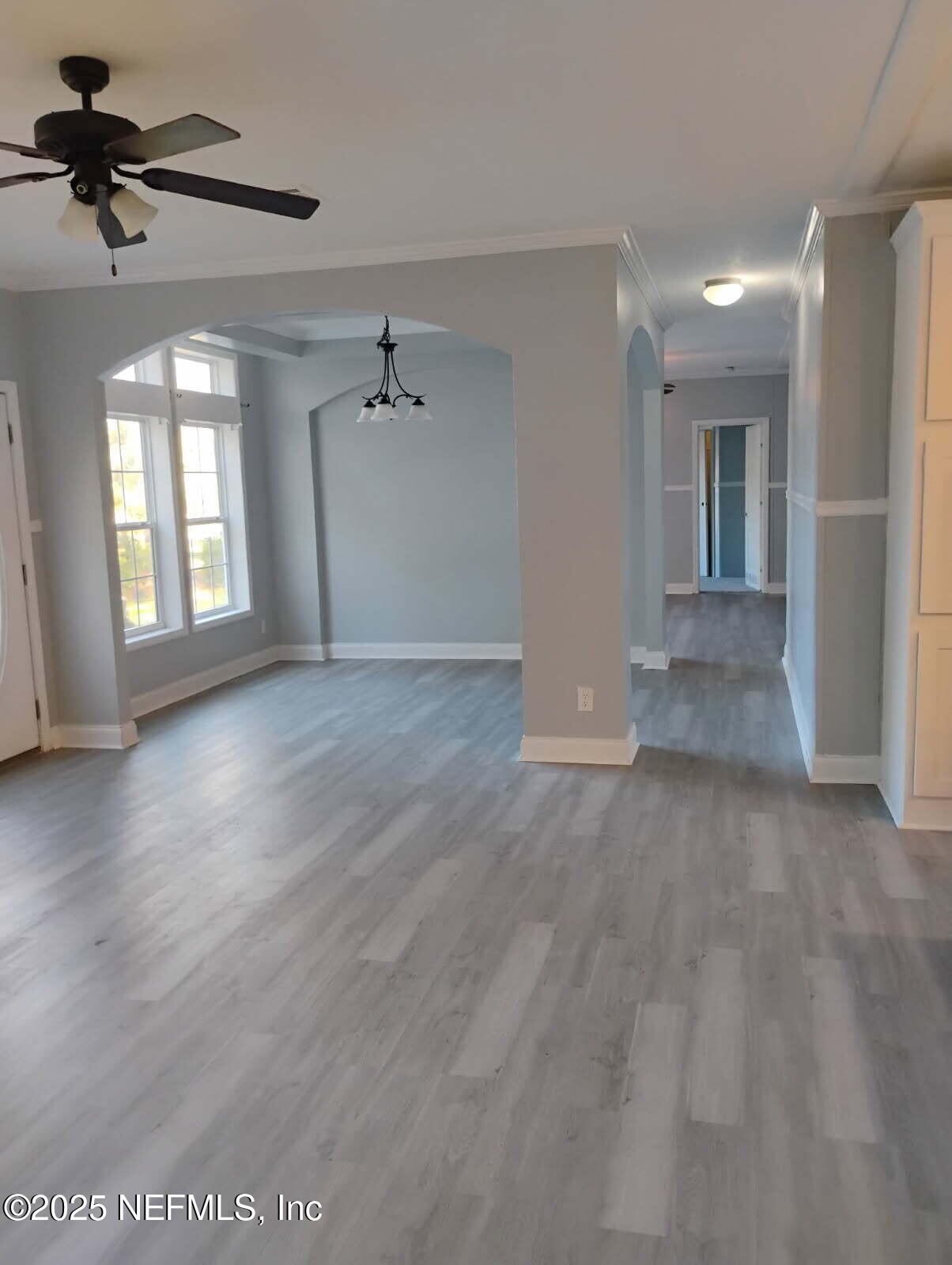 598 San Mateo Road San Mateo, FL 32187 - Photo 2 of 14 a view of an empty room with a window