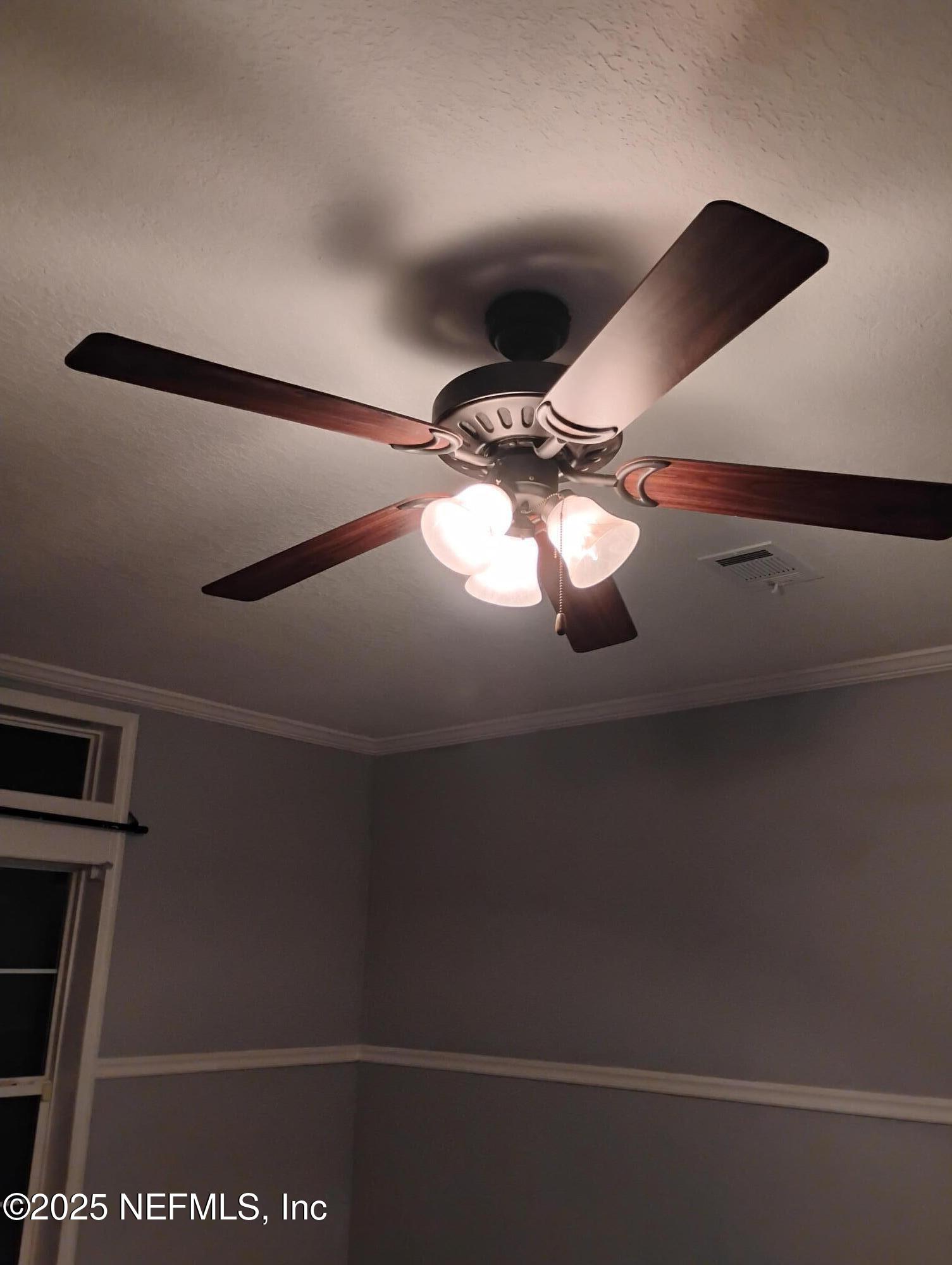 598 San Mateo Road San Mateo, FL 32187 - Photo 4 of 12 a view of ceiling fan