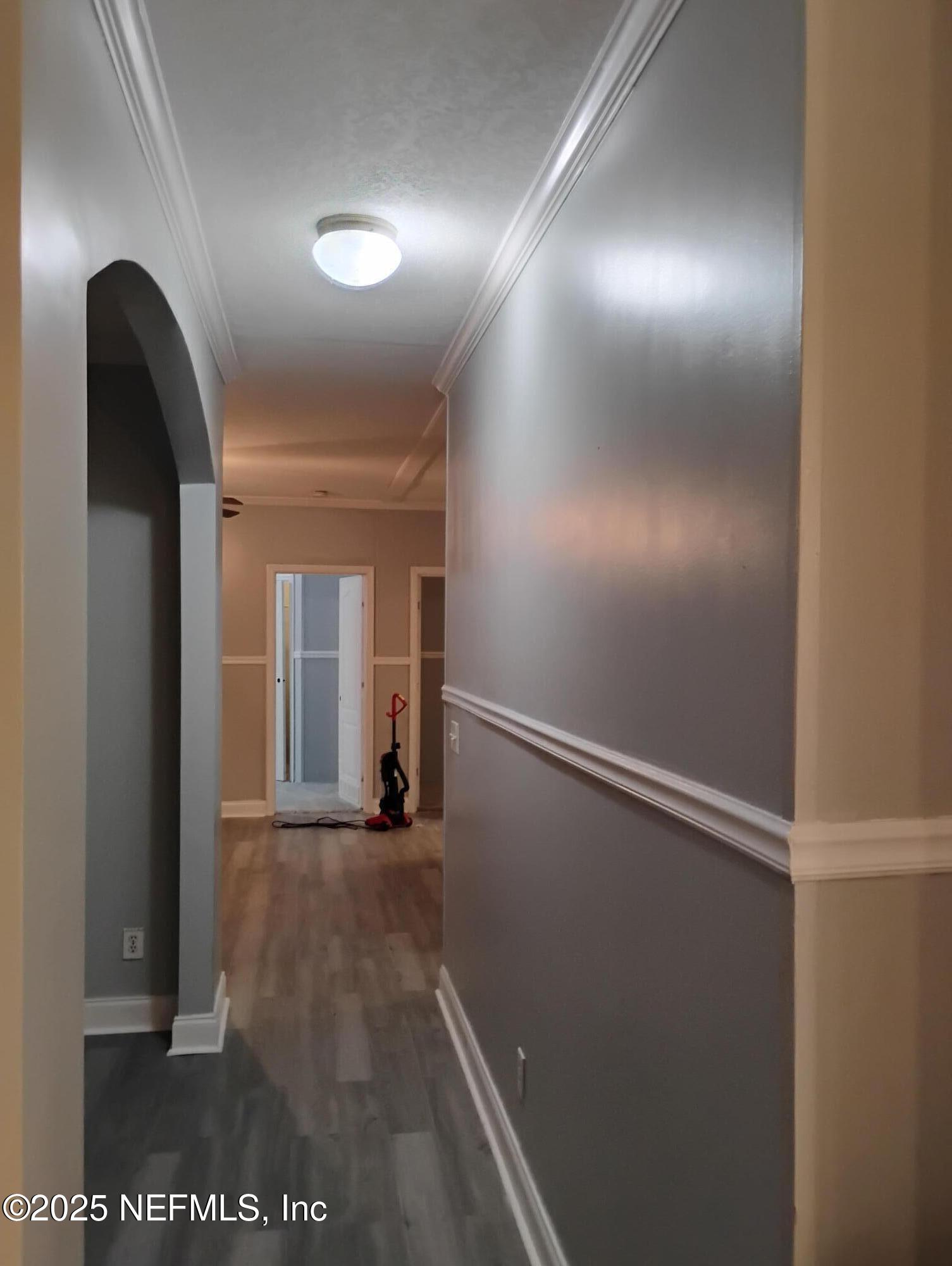 598 San Mateo Road San Mateo, FL 32187 - Photo 5 of 12 a view of gallery with wooden floor