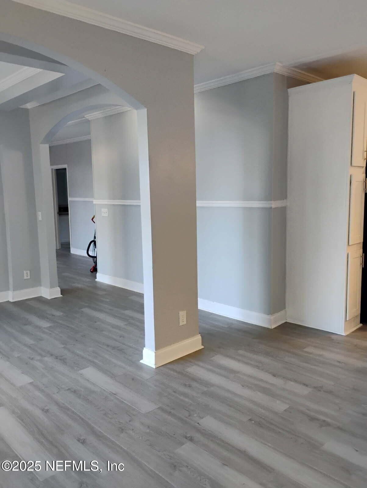 598 San Mateo Road San Mateo, FL 32187 - Photo 10 of 12 a view of empty room with wooden floor