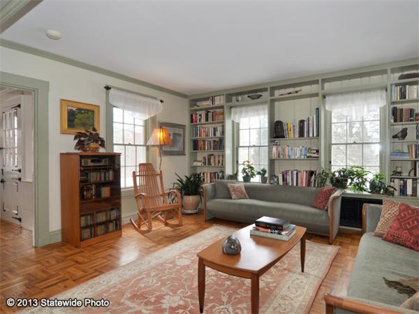 452 Highland Road Tiverton, RI 02878 - Photo 3 of 26 a living room with furniture and a wooden floor