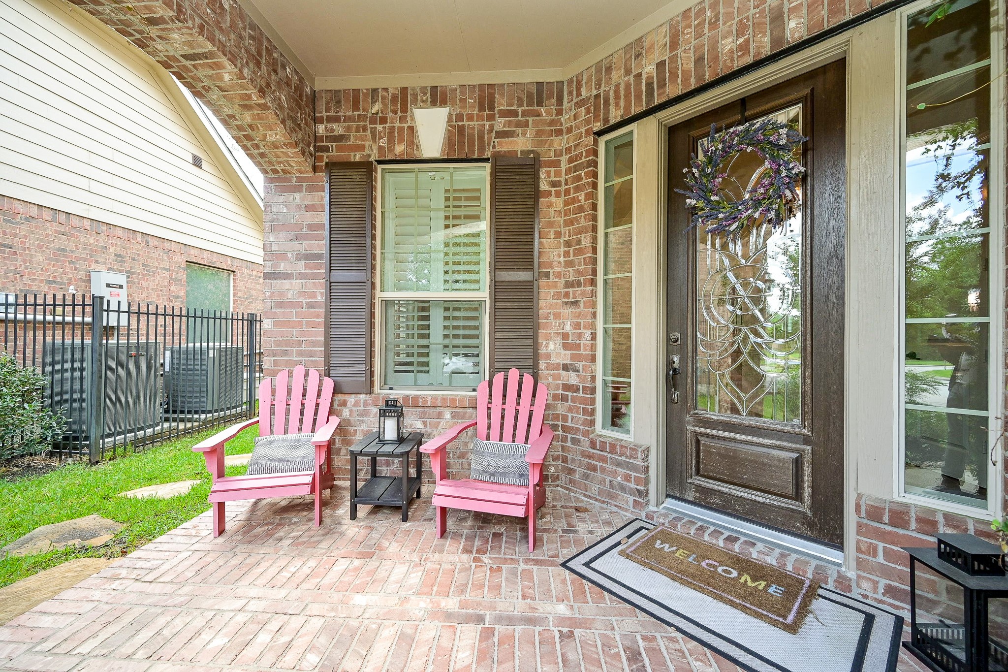 11 South Victoriana Circle Spring, TX 77389 - Photo 3 of 38 a backyard of a house with barbeque oven table and chairs