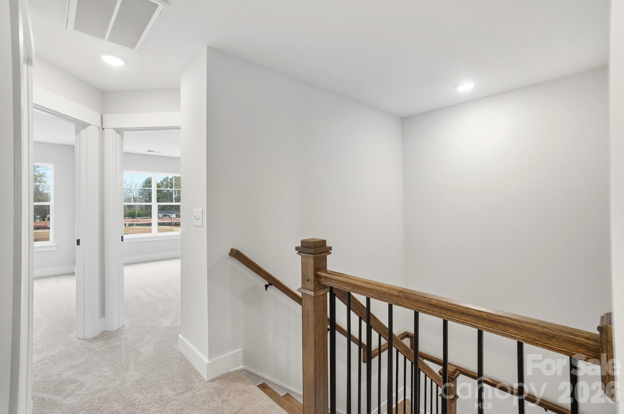 410 Limelight Road Waxhaw, NC 28173 - Photo 14 of 27 a view of hallway with stairs