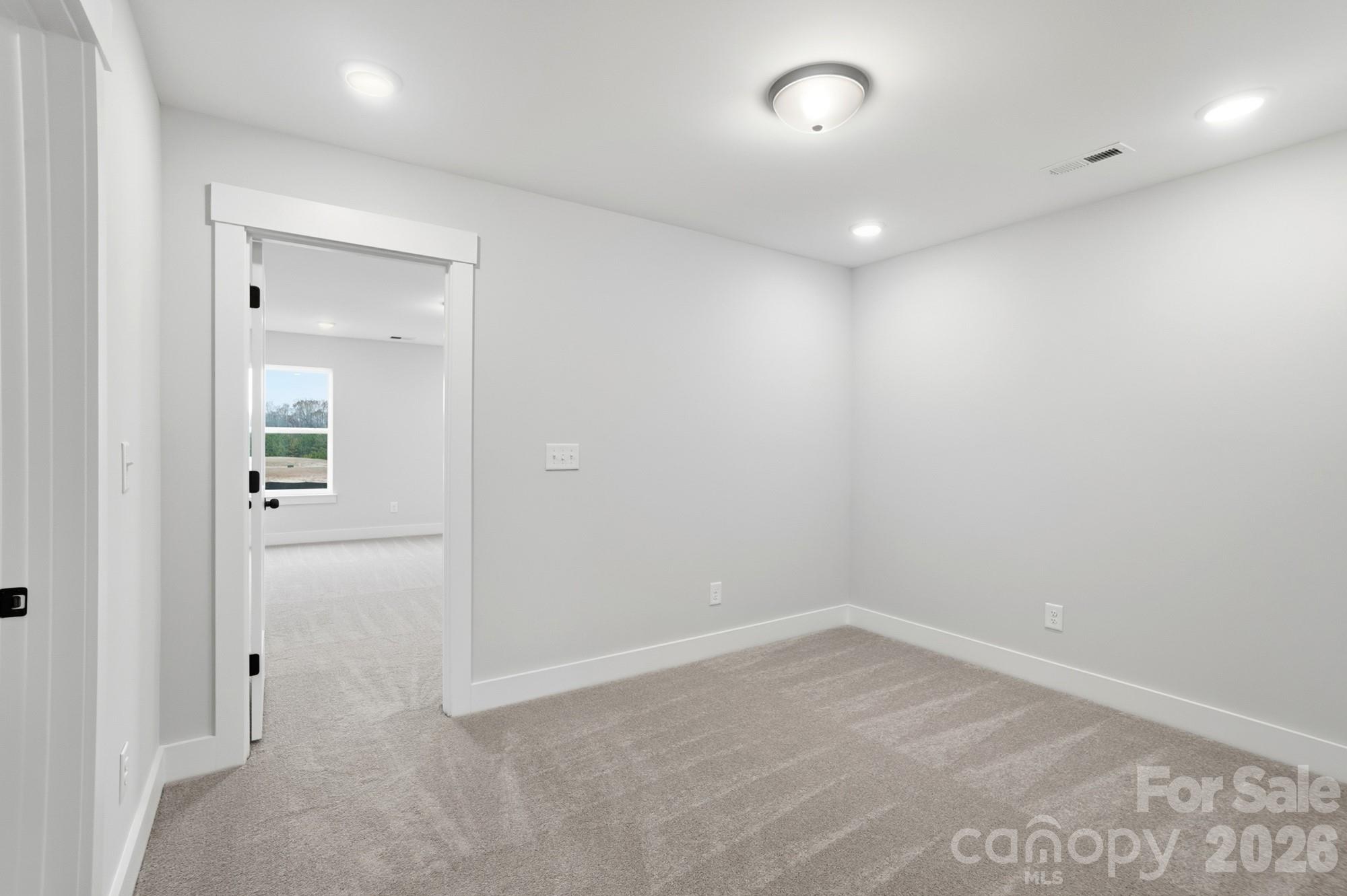 410 Limelight Road Waxhaw, NC 28173 - Photo 15 of 27 wooden floor in an empty room