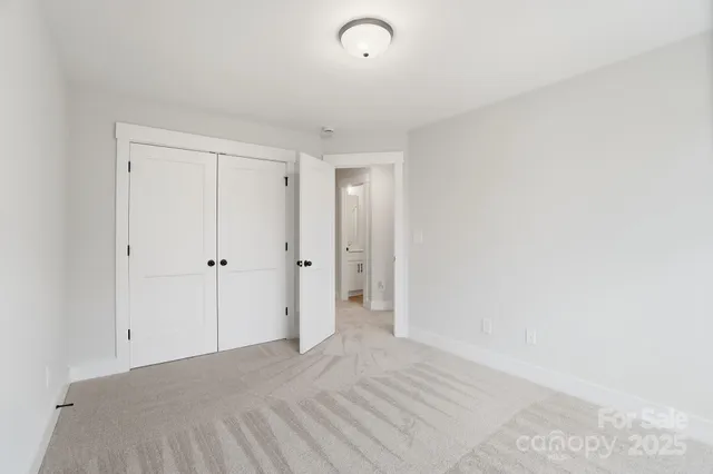 a view of room with racks on the wall