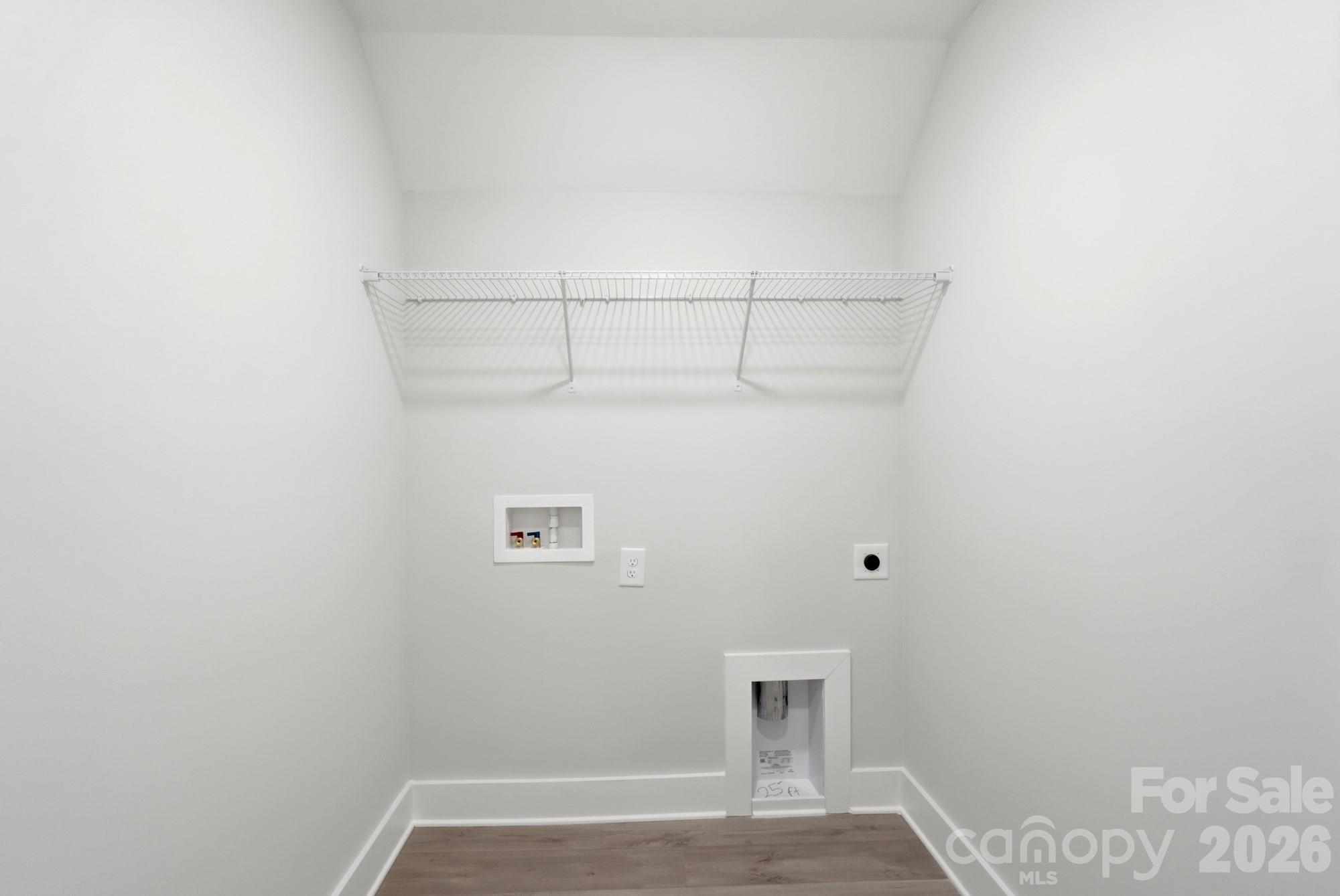410 Limelight Road Waxhaw, NC 28173 - Photo 24 of 27 a view of room with racks on the wall