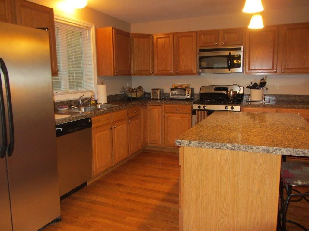 1161 Mammoth Road Pelham, NH 03076 - Photo 3 of 14