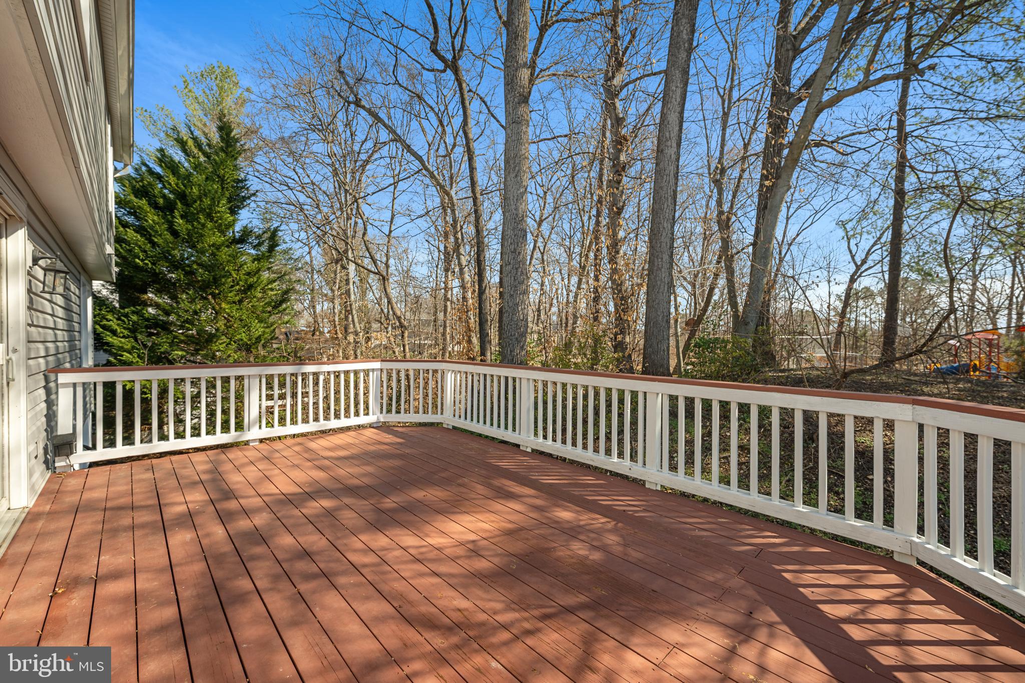 8411 Chillum Court Springfield, VA 22153 - Photo 35 of 44 Wooden Deck Backs to Trees