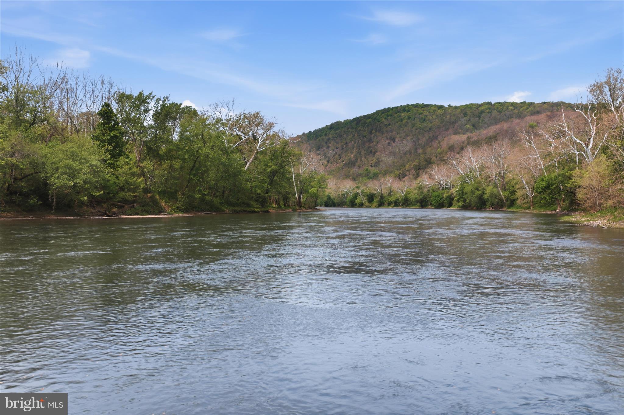 Low Line Road Great Cacapon, WV 25422 - Photo 21 of 53 a view of a lake view with mountains in the background