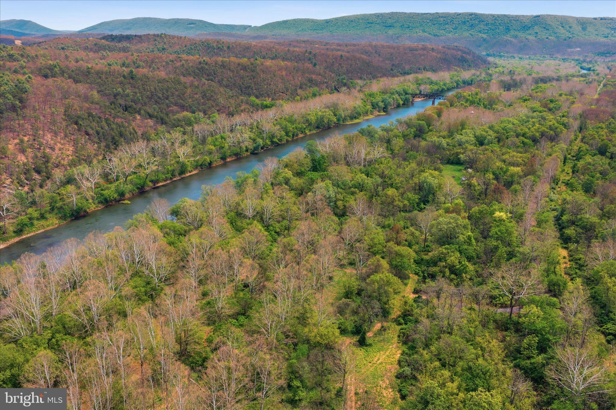 Low Line Road Great Cacapon, WV 25422 - Photo 34 of 53 a view of a lake with a mountain
