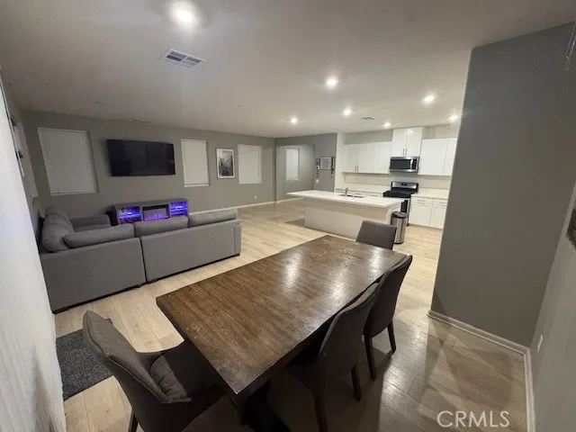 a view of a dining room with furniture