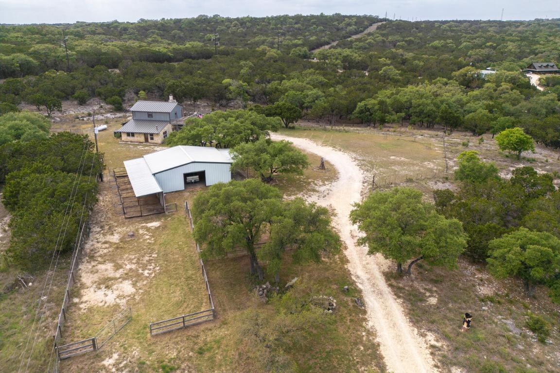 3487 Rust Spring Branch, TX 78070 - Photo 1 of 40 a view of a lake with mountains in the background