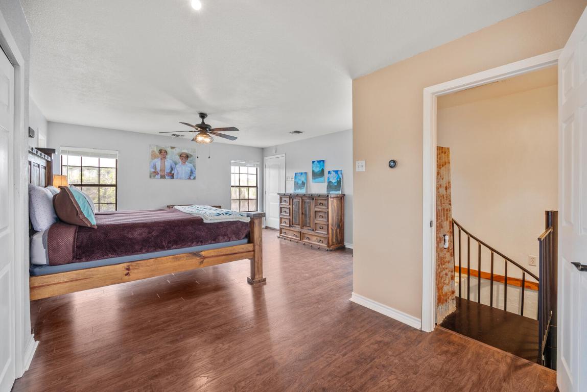 3487 Rust Spring Branch, TX 78070 - Photo 16 of 40 a living room with furniture and a wooden floor