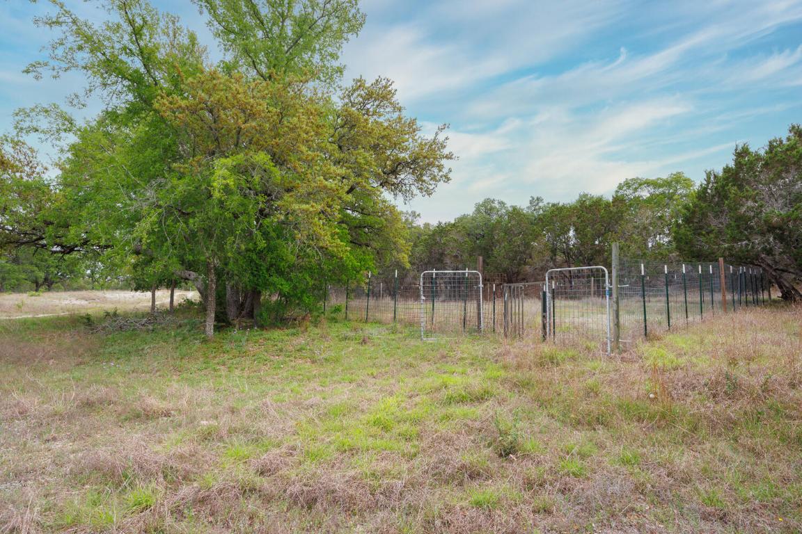 3487 Rust Spring Branch, TX 78070 - Photo 29 of 40 a backyard of a house with lots of green space