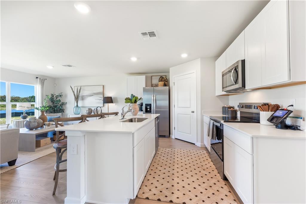 14176 Hemingway Oaks Trail Fort Myers, FL 33905 - Photo 7 of 18 MODEL