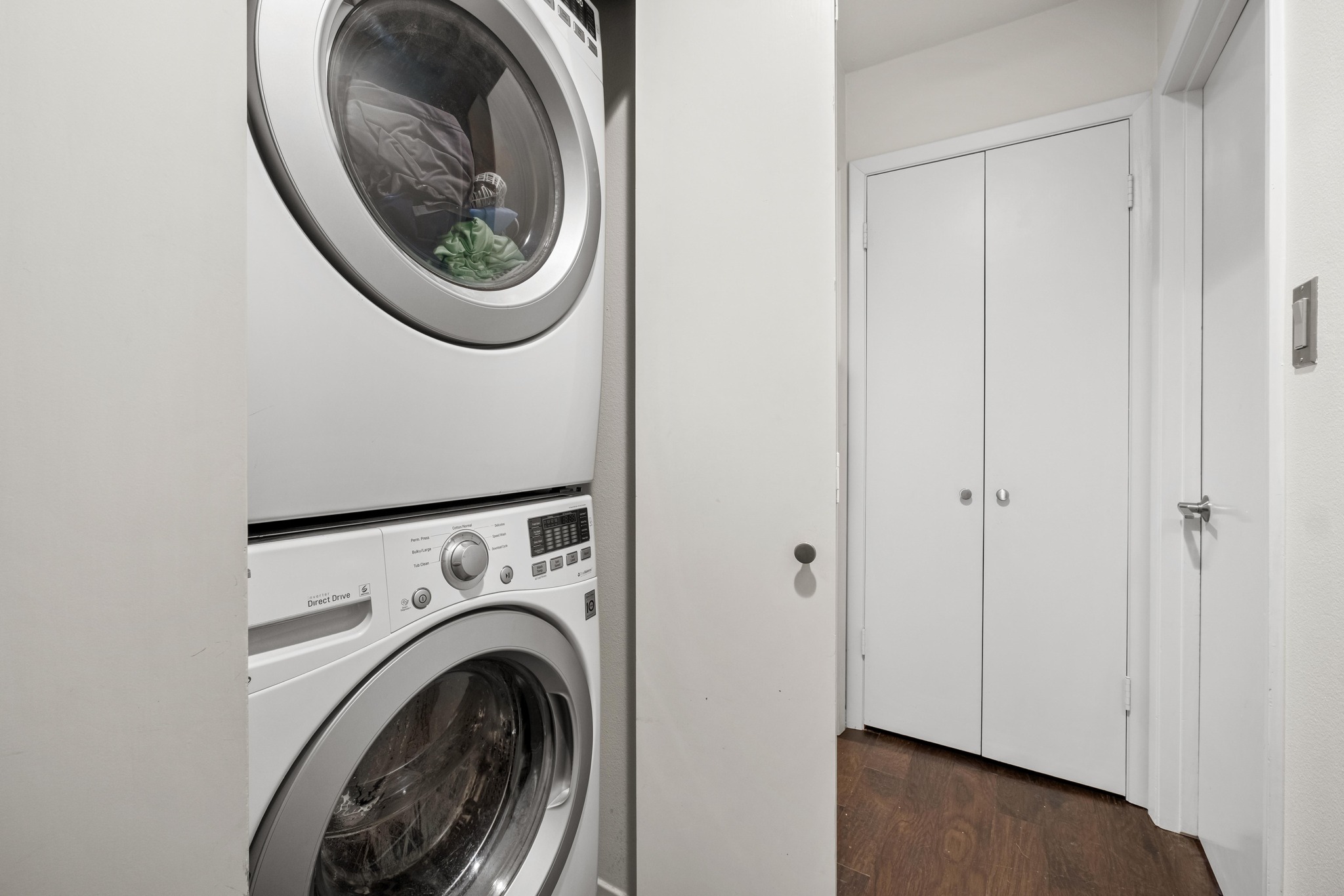 2802 Warren Street, Unit B Austin, TX 78703 - Photo 18 of 23 Dedicated laundry area featuring a stacked washer and dryer