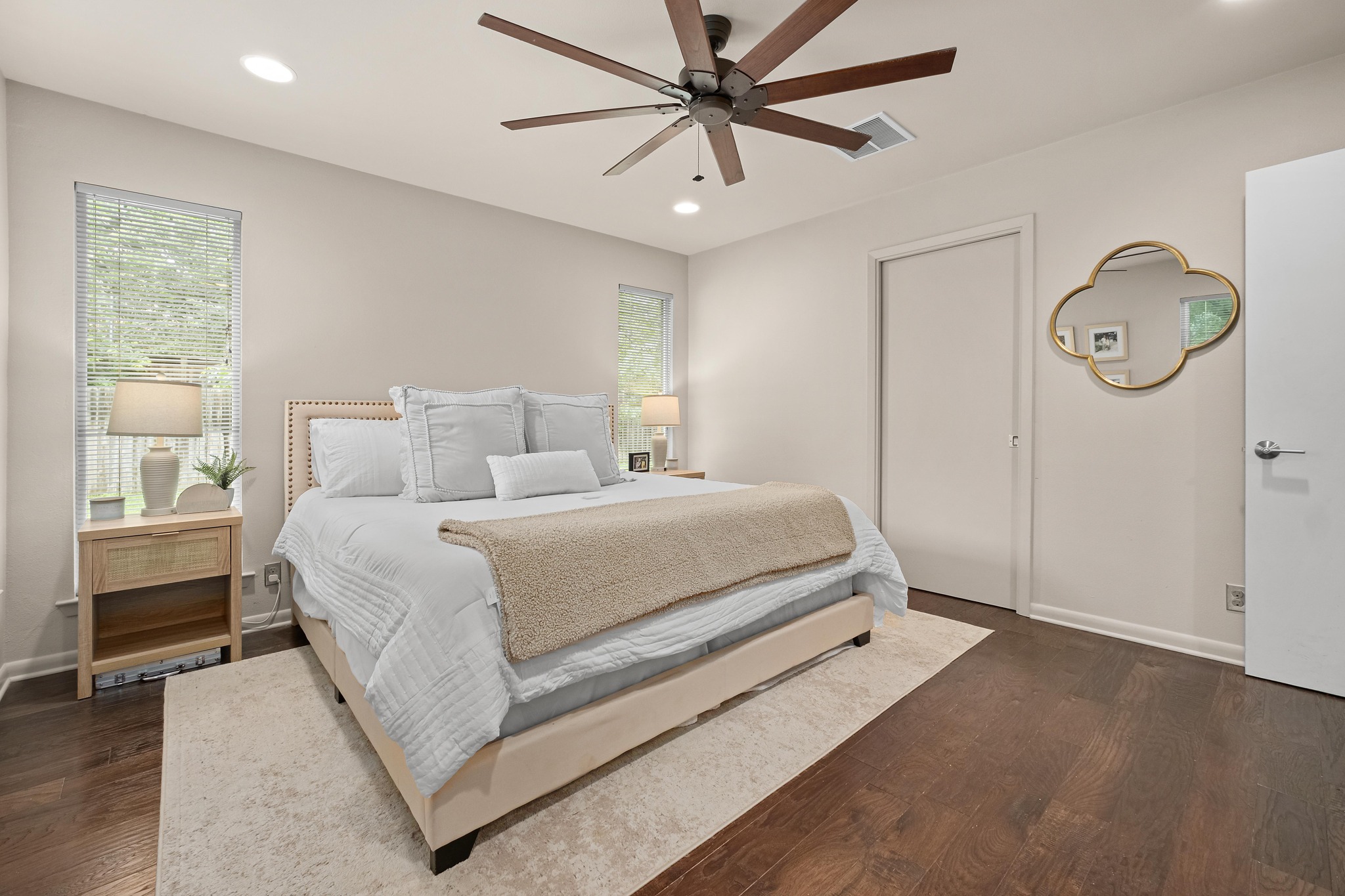 2802 Warren Street, Unit B Austin, TX 78703 - Photo 10 of 23 Bedroom featuring rich wood-finish flooring, recessed lighting, and a multi-blade ceiling fan