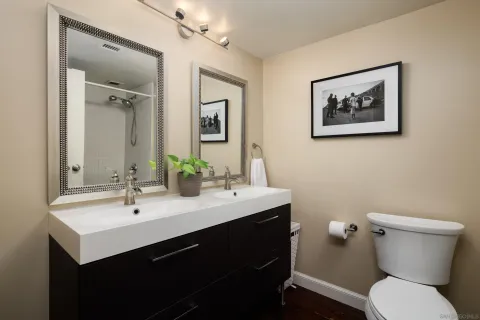 a white bath tub with a shower