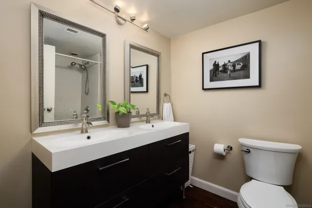 a white bath tub with a shower