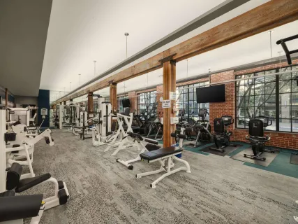a view of swimming pool with outdoor seating and plants