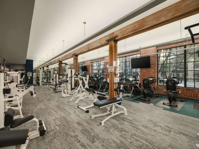 a view of swimming pool with outdoor seating and plants