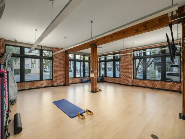 a view of a chairs and table in the back yard
