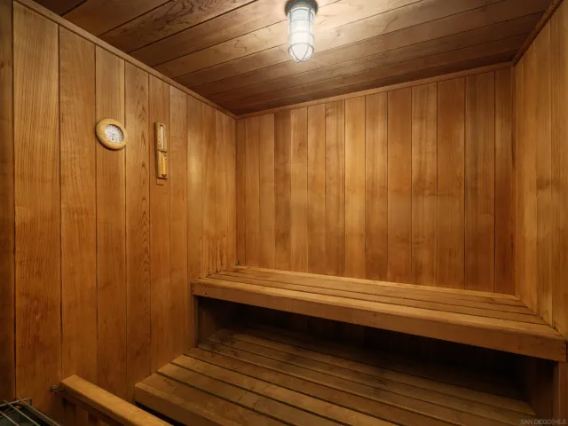 a view of a swimming pool with a lounge chairs