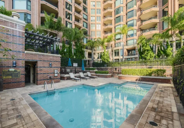 a view of a chairs and table in the patio