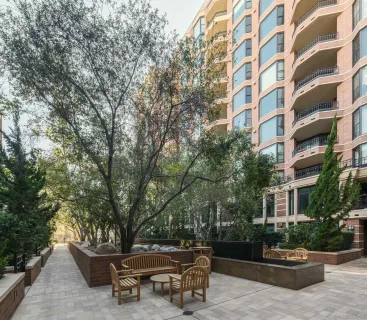a view of a dinning table and chairs in patio