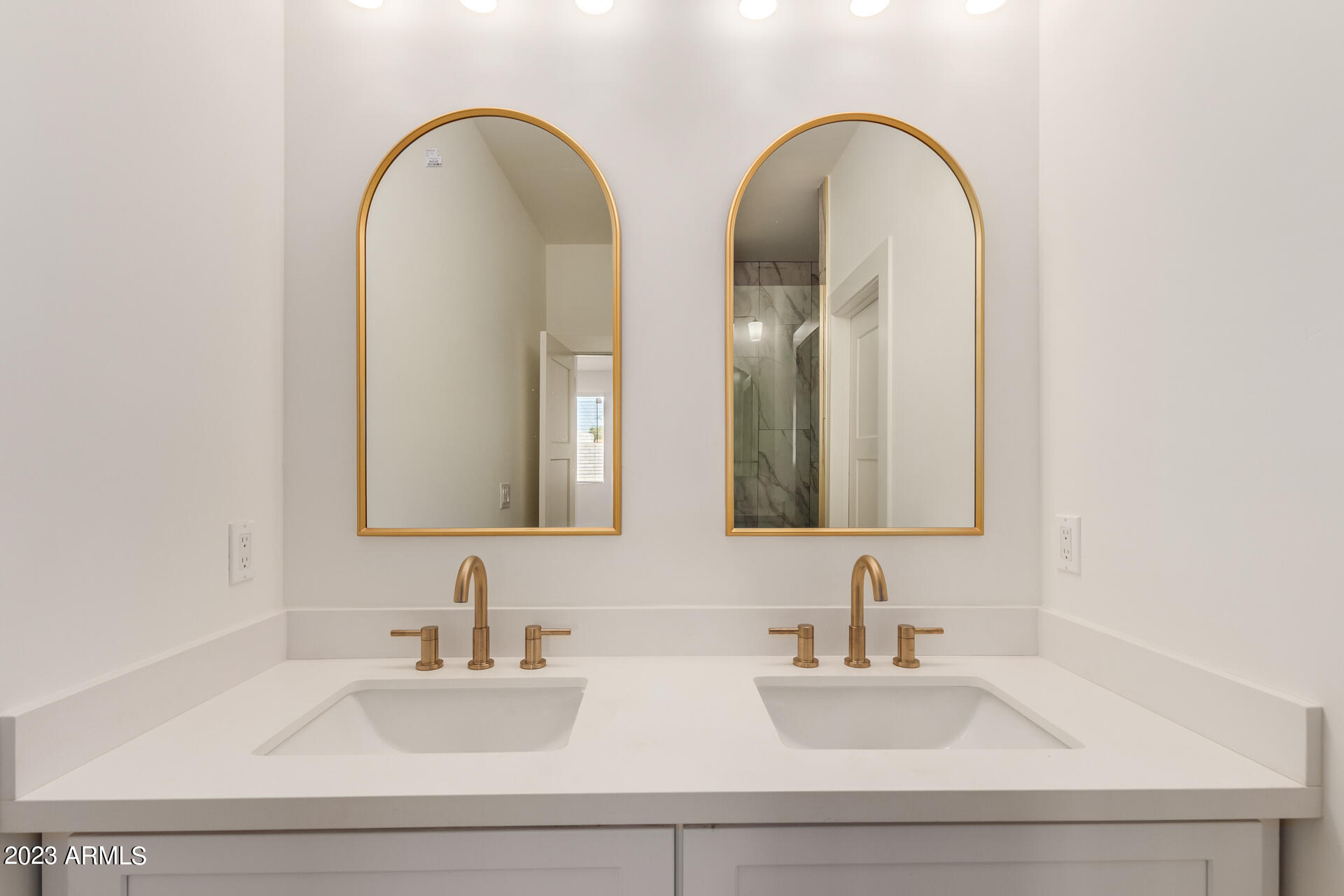 Undisclosed Address Phoenix, AZ 85014 - Photo 28 of 47 a bathroom with a double vanity sink and a mirror