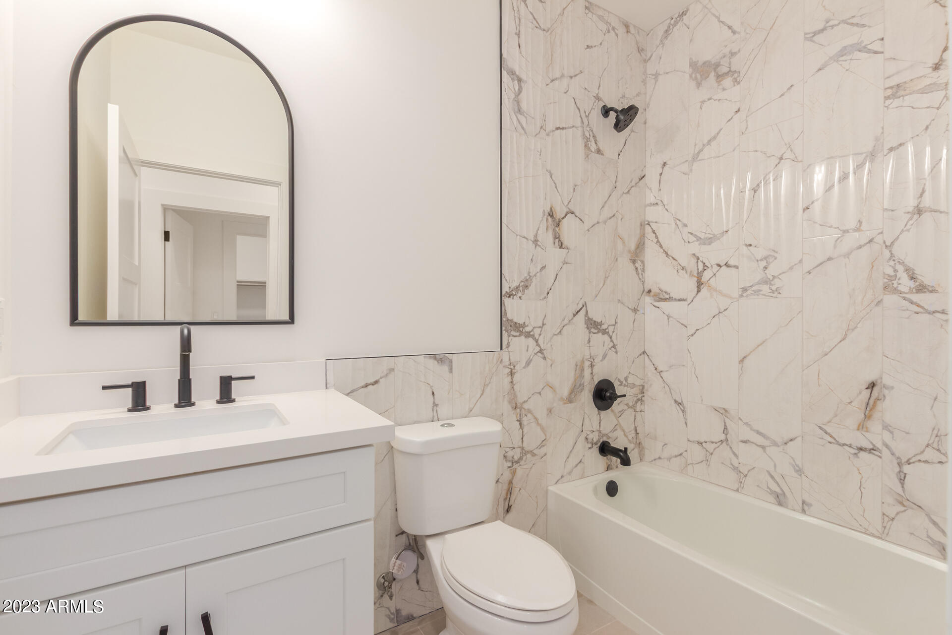 Undisclosed Address Phoenix, AZ 85014 - Photo 40 of 47 a bathroom with a toilet sink vanity tub and shower