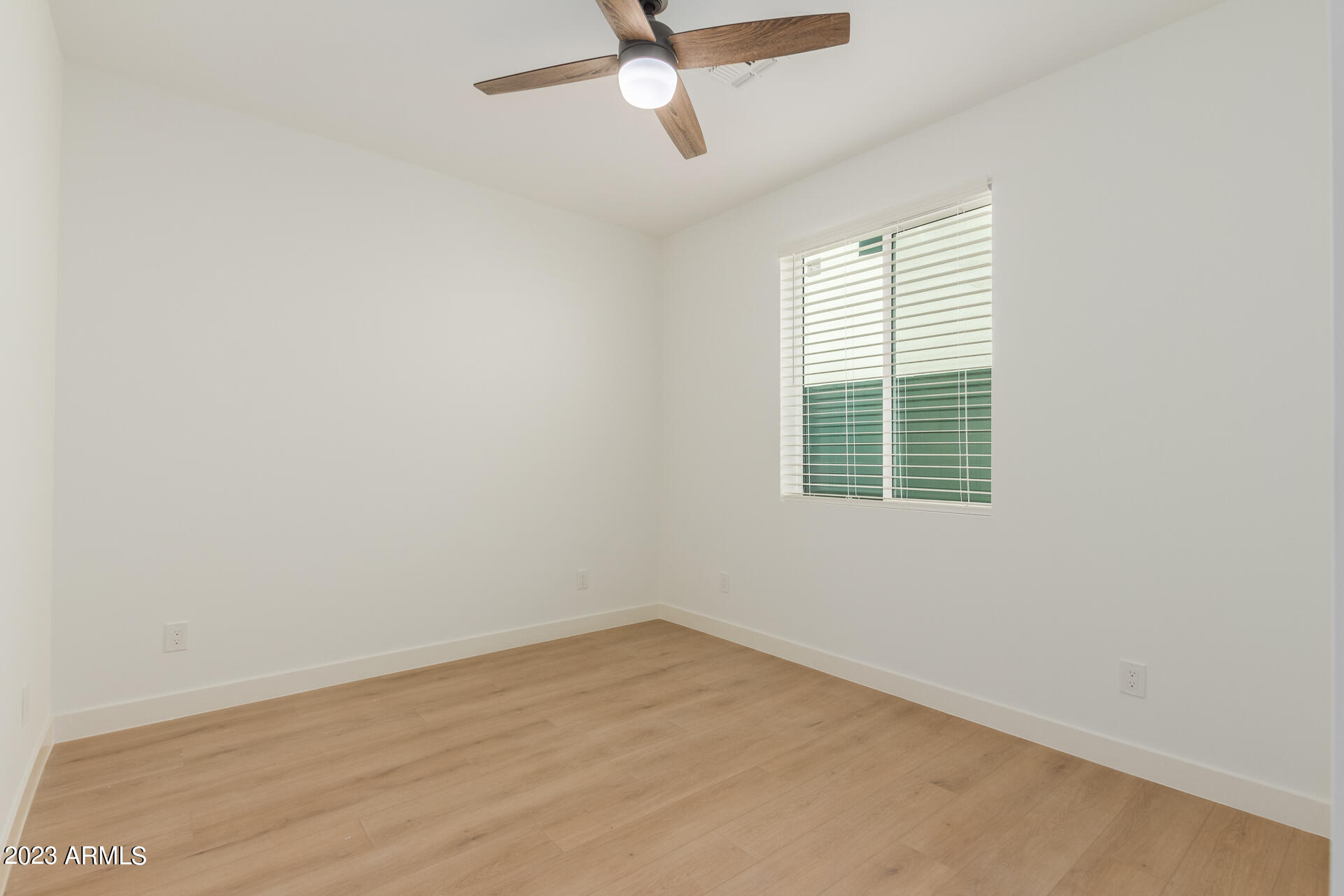 Undisclosed Address Phoenix, AZ 85014 - Photo 42 of 47 an empty room with a window