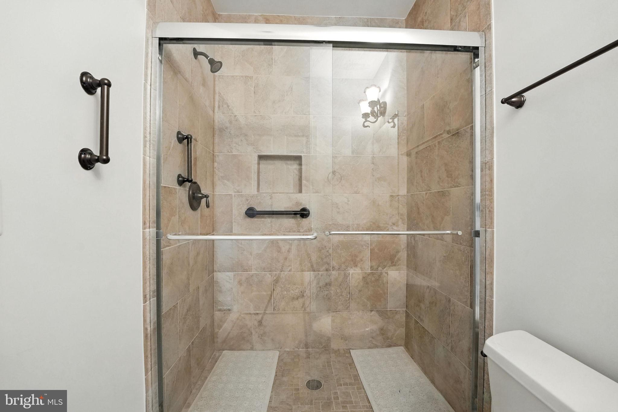 43152 Valiant Drive Chantilly, VA 20152 - Photo 32 of 44 a bathroom with a shower