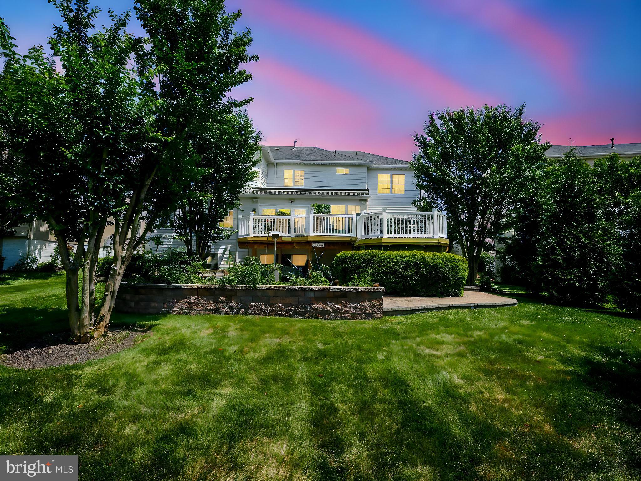 43152 Valiant Drive Chantilly, VA 20152 - Photo 39 of 44 a front view of a house with a yard