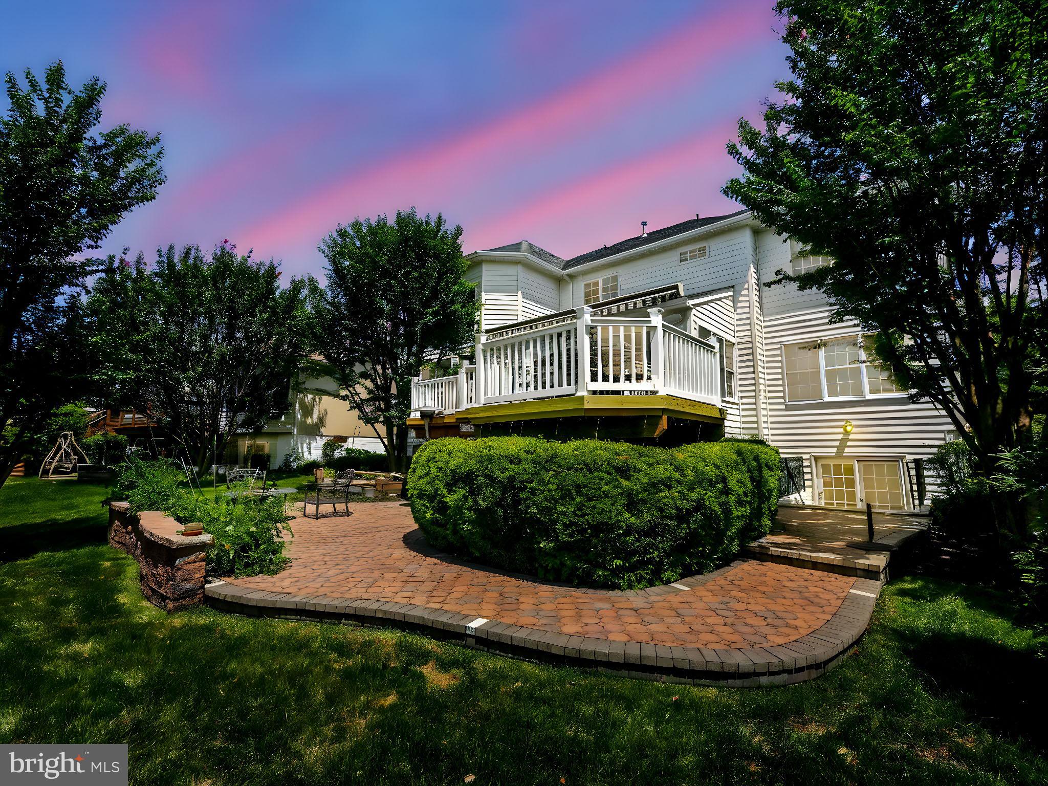 43152 Valiant Drive Chantilly, VA 20152 - Photo 40 of 44 a front view of a house with a yard