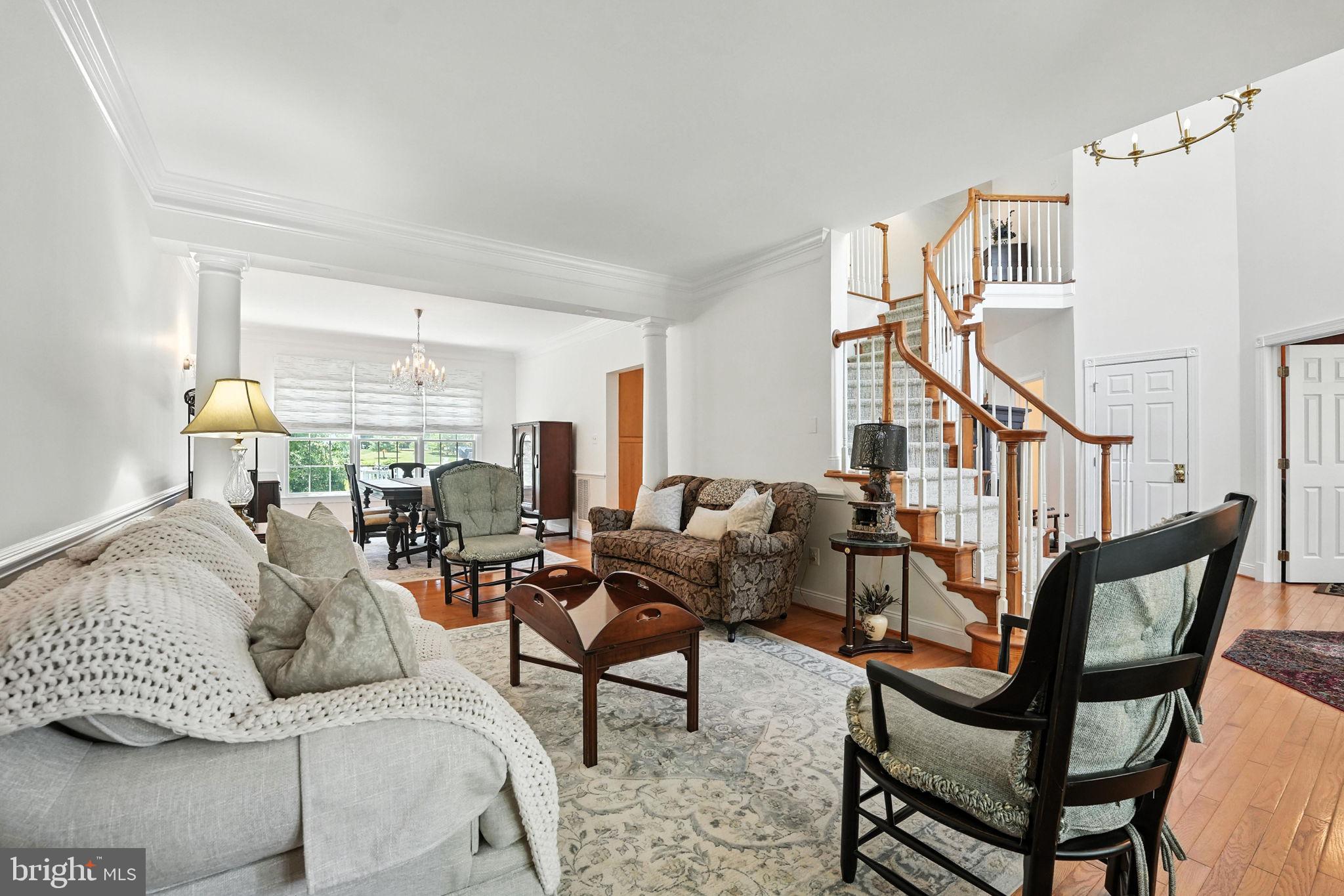 43152 Valiant Drive Chantilly, VA 20152 - Photo 8 of 44 a living room with furniture and a window