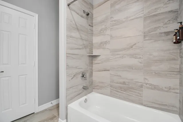 a bathroom with a bathtub